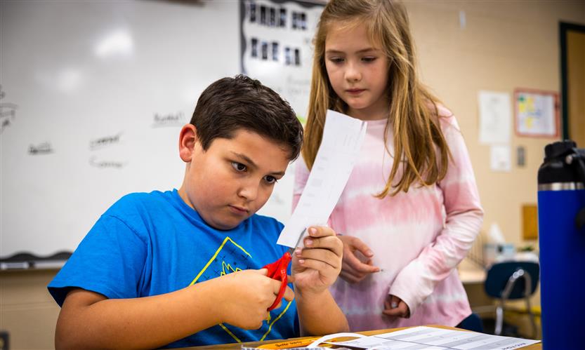 Students make paper houses